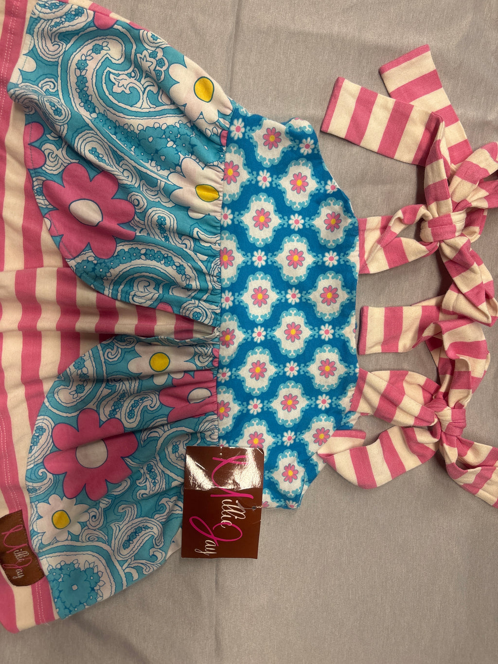 Swing back multicolored top